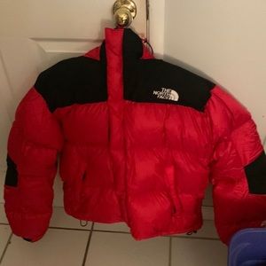 This is a North Face red and black men xl jacket